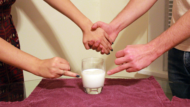 Illustration for article titled Astounding: 7 Incredible Photos Of Hands Pointing To Glasses Of Milk With Their Ring Fingers